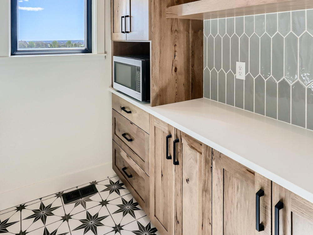 custom backsplash with cabinetry and tile flooring